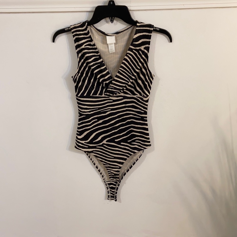 Tan and black zebra print bodysuit
